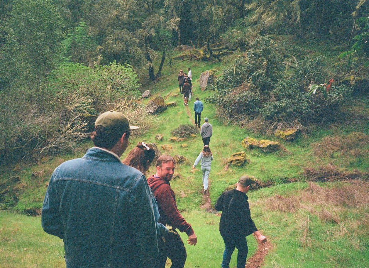 Team hike through streambeds
